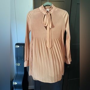 Light pink blouse with high neck tie